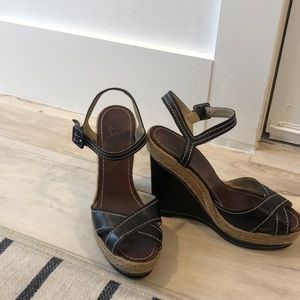 Christian Louboutin black wedges worn